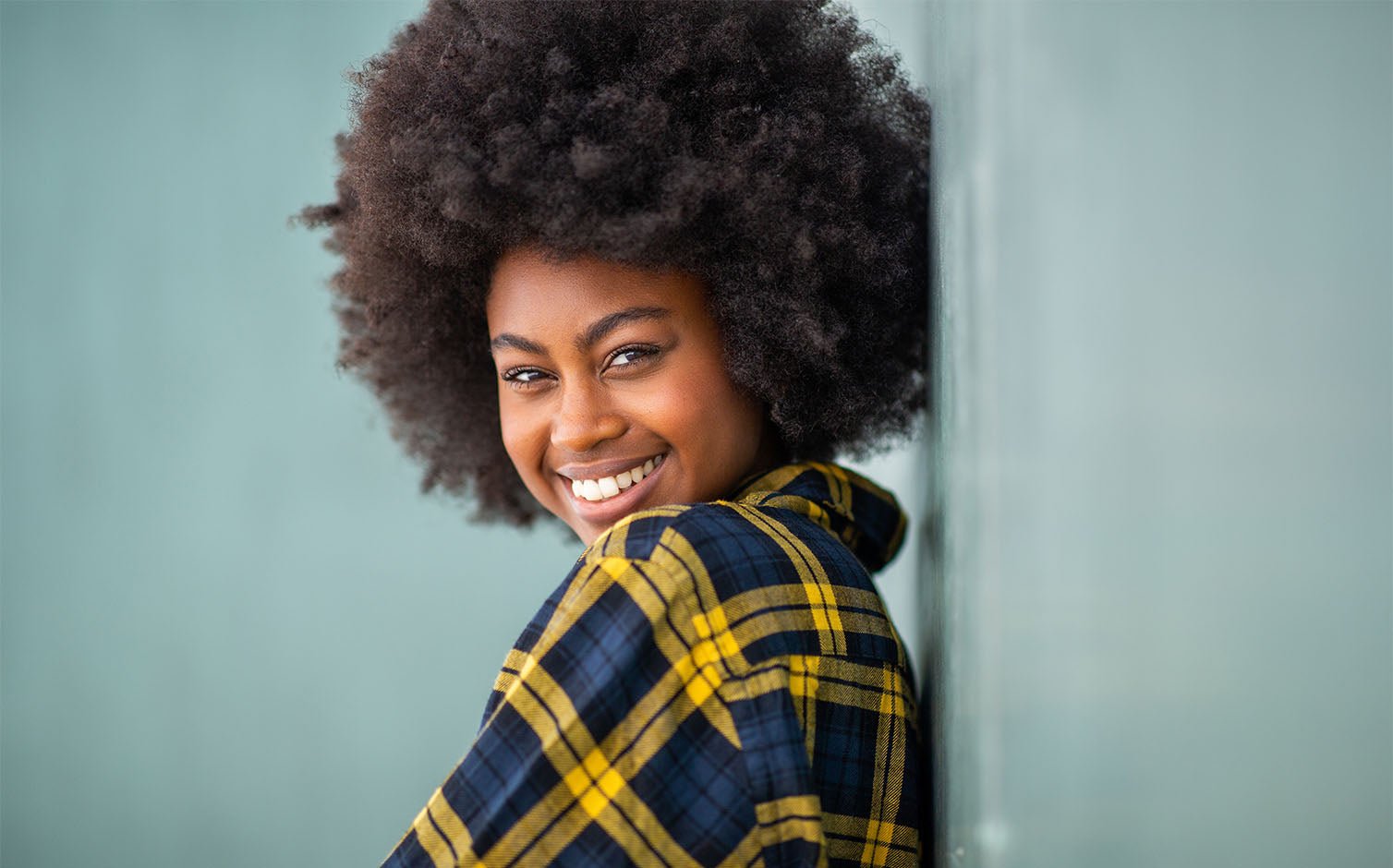 Embrace Your Natural Beauty: The Ultimate Guide to Transitioning to Natural Hair - OrganiGrowHairCo