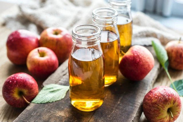 Apple Cider Vinegar a home remedies for dark spots - OrganiGrowHairCo