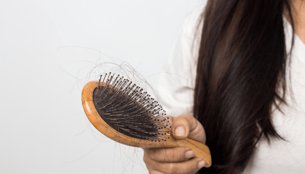 How can I prevent postpartum hair loss? - OrganiGrowHairCo