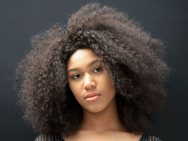 How to combat dryness and keep curly hair healthy - OrganiGrowHairCo