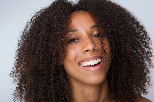 The Science Behind Curly Hair: Understanding Curl Patterns and Hair Types - OrganiGrowHairCo