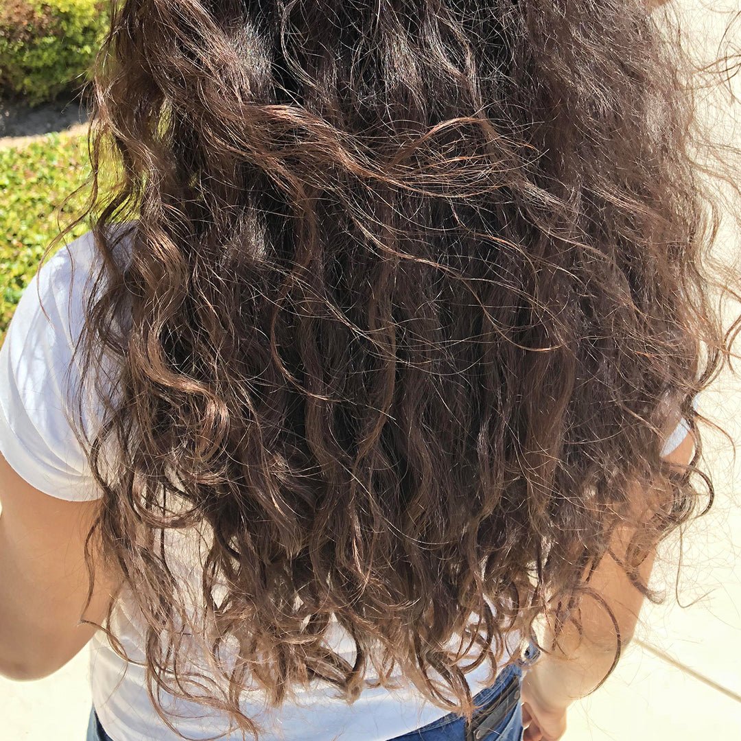 Why is my hair still dry after using oil? - OrganiGrowHairCo