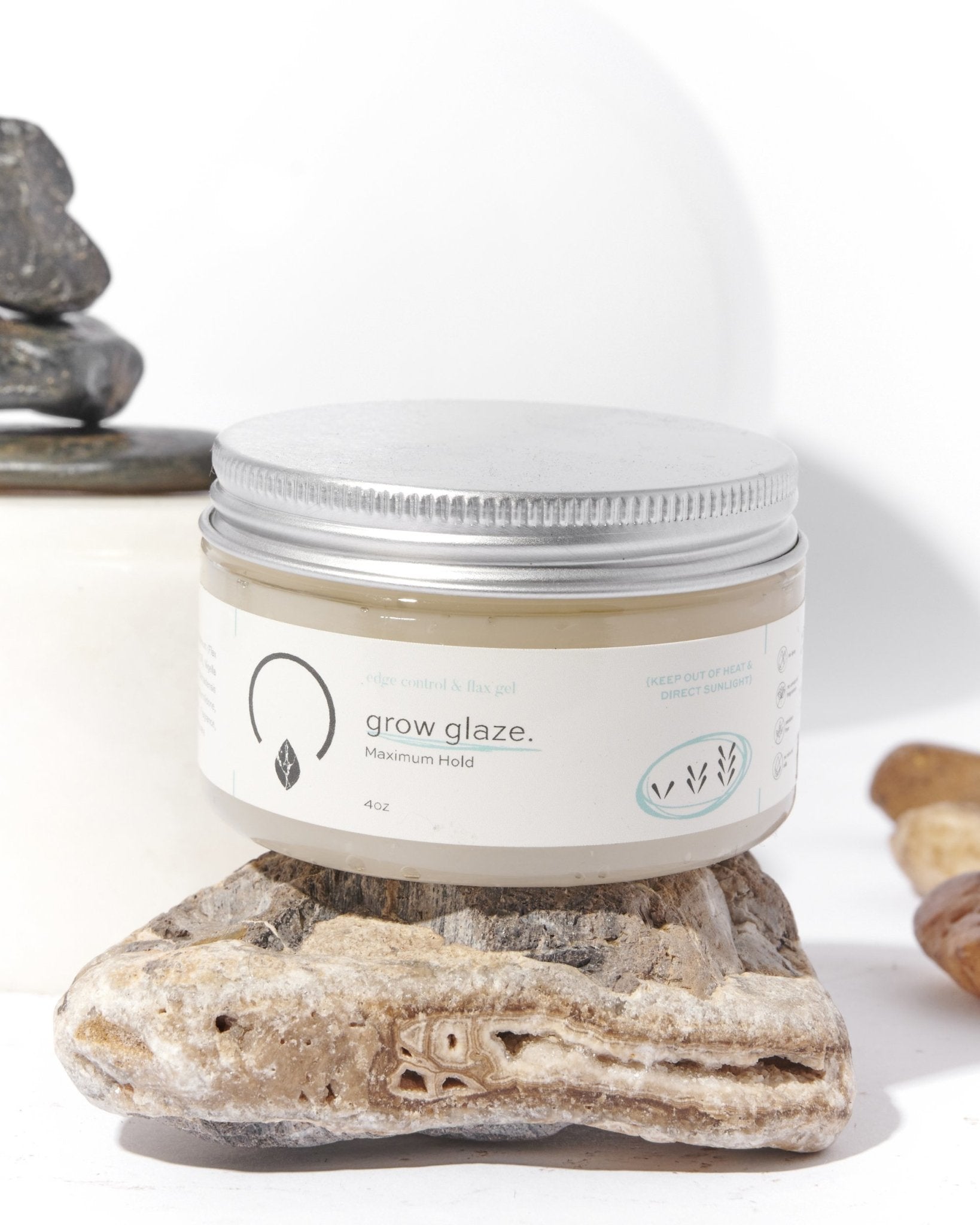 Grow Glaze Edge Control – Strong hold, non-toxic, and moisturizing formula for sleek edges and long-lasting style. Infused with natural ingredients like Castor Oil and Shea Butter to nourish, strengthen, and add shine without flaking or buildup.