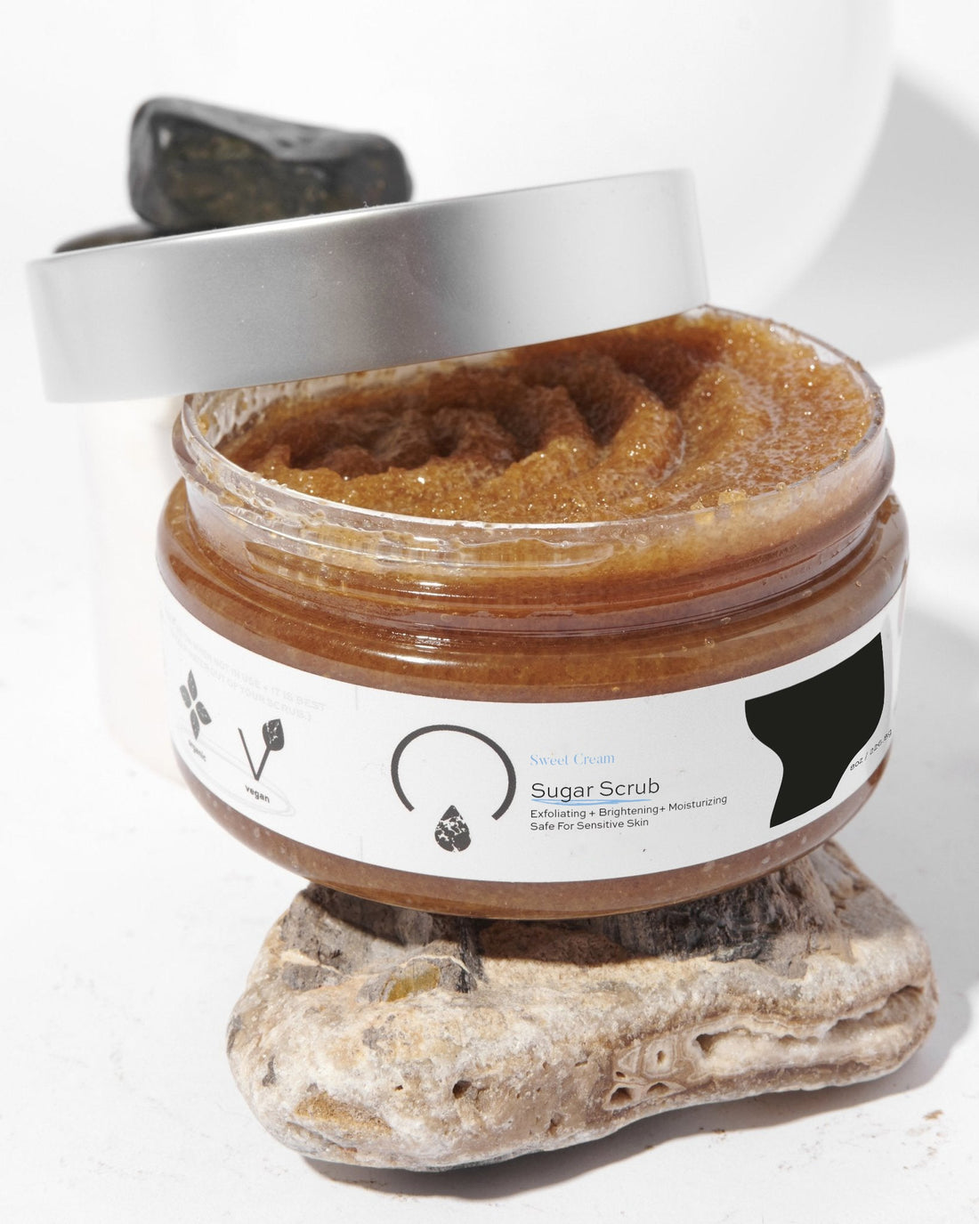 Sweet Cream Sugar Scrub – Exfoliating and brightening sugar scrub for face and body, made with organic essential oils.